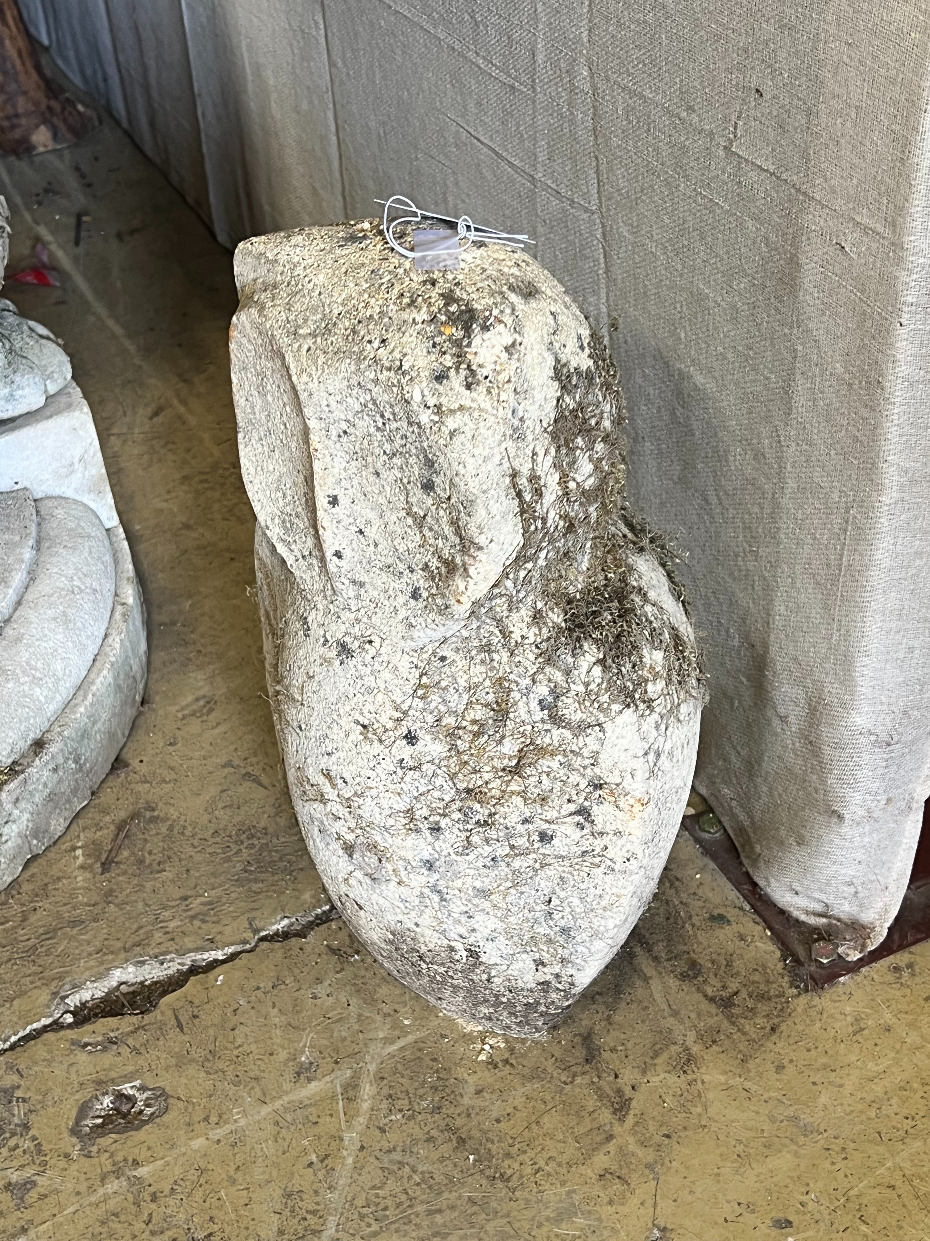 A reconstituted stone owl garden ornament, height 49cm